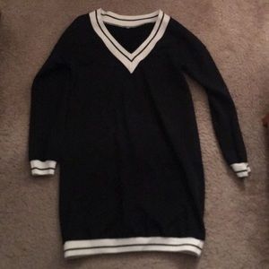 Long black sweater with white trim